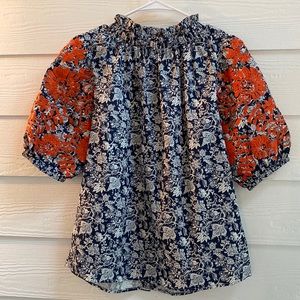 Avara navy and white blouse with orange embroidery on the sleeves. Size S.